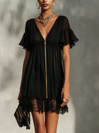 Black mini dress with lace finishes, closed with a zipper, V-neckline
